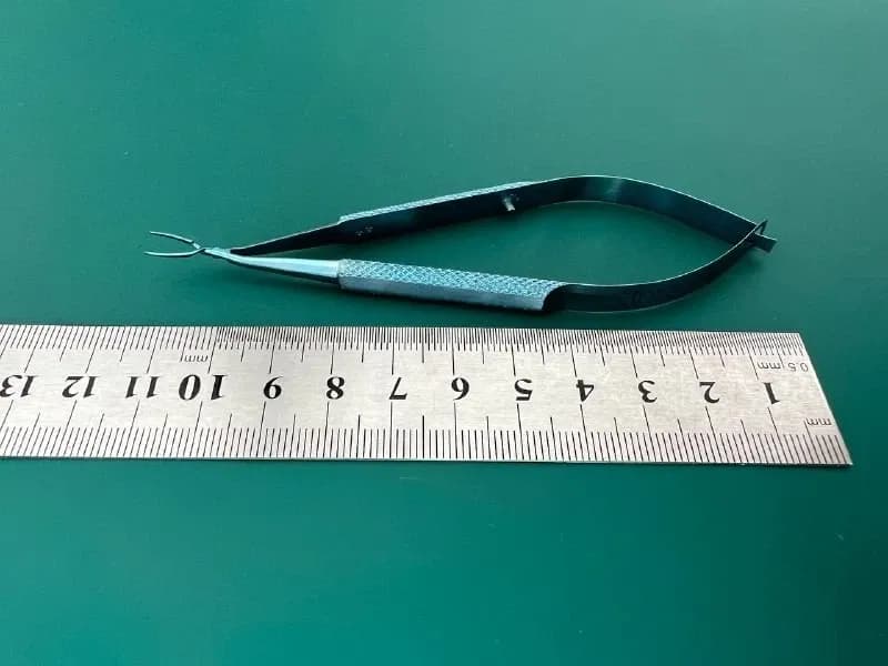 Storz ET2901 Hall lens insertion forceps, 4 1/4'',angled, thin, long jaws