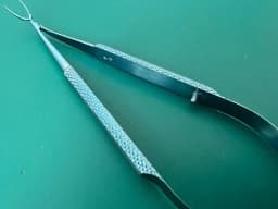Storz ET2901 Hall lens insertion forceps, 4 1/4'',angled, thin, long jaws