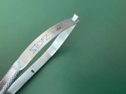 Storz ET2901 Hall lens insertion forceps, 4 1/4'',angled, thin, long jaws