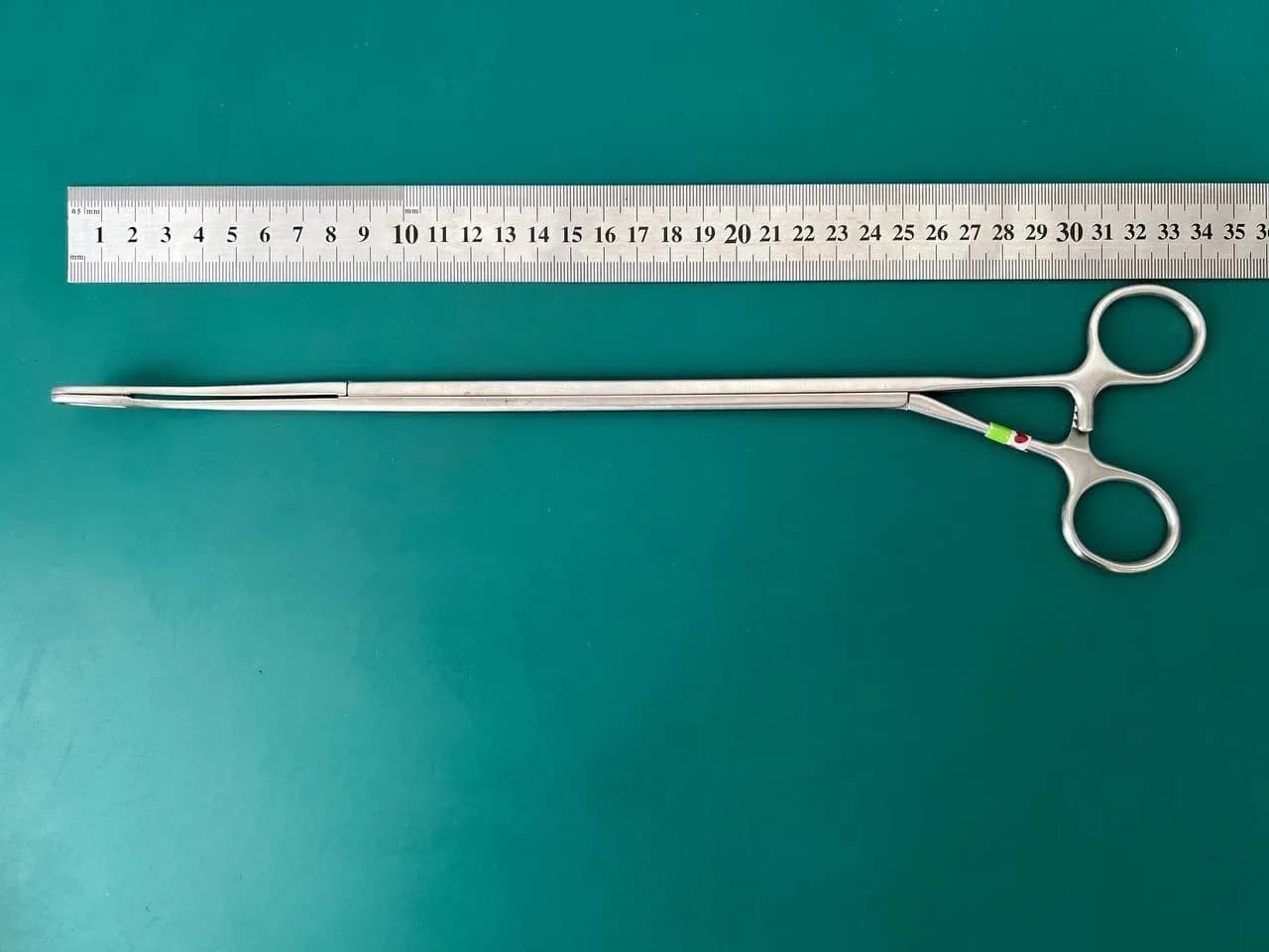 Jarit 323-112 Foerster Clamp, 0.8mm Horizontal Serrations, 15° Bend, 10mm Dia