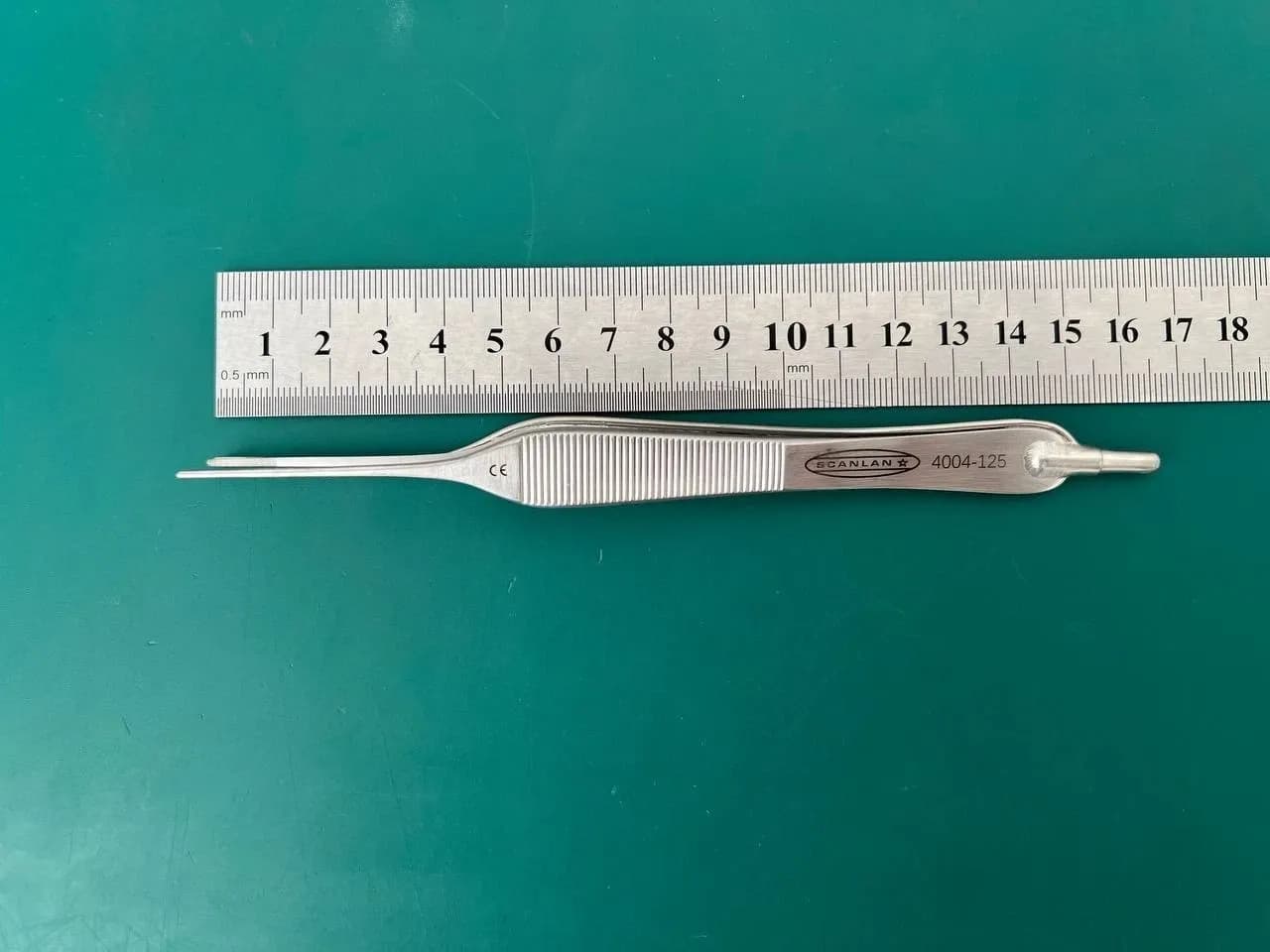 Scanlan 4004-125 Broli-Adson Forceps 1.2 mm serrated tips, one suction cannula
