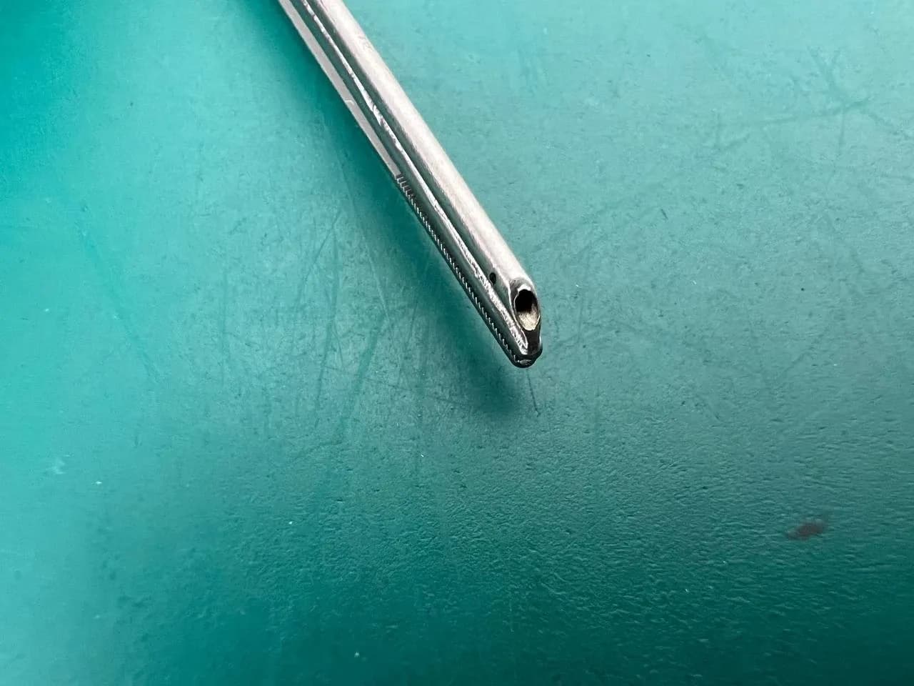 Scanlan 4004-125 Broli-Adson Forceps 1.2 mm serrated tips, one suction cannula