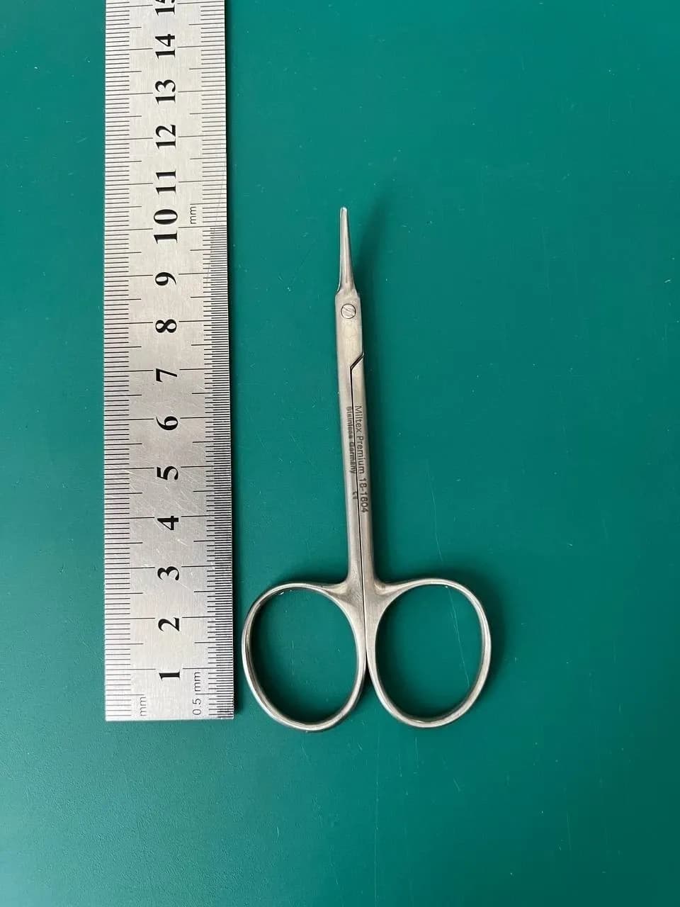 MILTEX 18-1604 AEBLI Corneal Scissors, 4" (10.2 cm), angled on flat, left