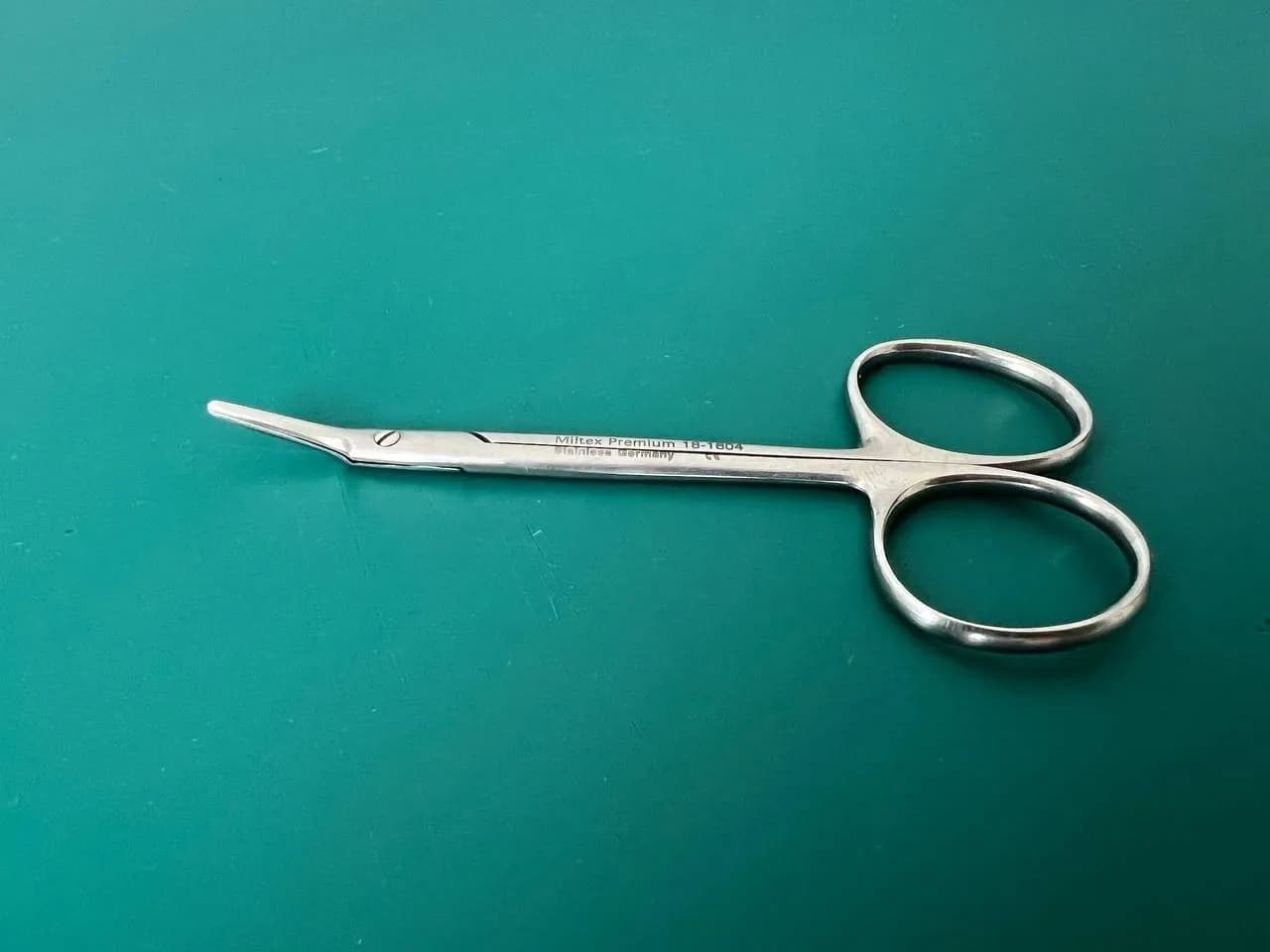 MILTEX 18-1604 AEBLI Corneal Scissors, 4" (10.2 cm), angled on flat, left